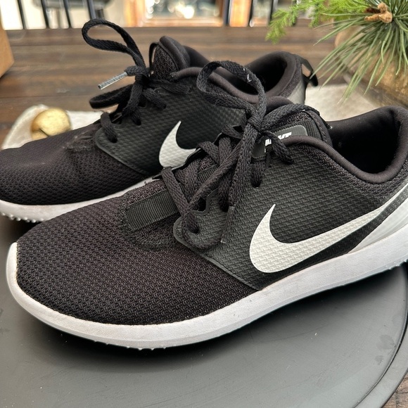 Nike Shoes - Nike women’s  Black Running Shoes